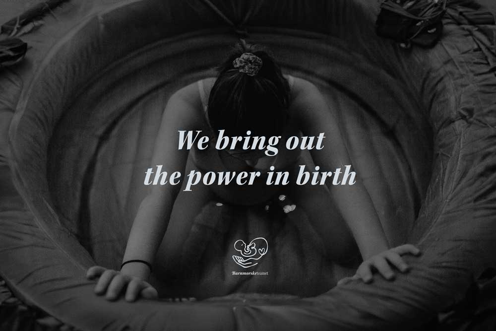 Woman sitting in a birth pool